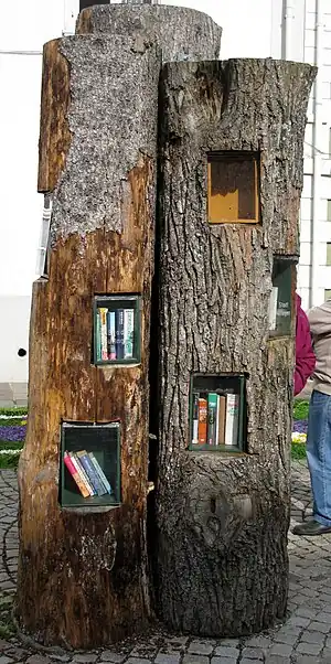 A public bookcase made out of a tree. Hüfingen, Germany