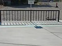 Wide spaced grid bike rack with a 22 bike capacity.