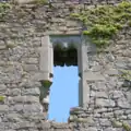 Remains of a double-ogee window in a castle ruin in Co. Kilkenny, Ireland