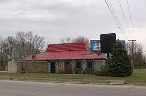 From aerial imagery, this building appears to have all the distinctive features of a Pizza Hut restaurant, but it is actually something else.