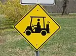 Golf cart warning sign