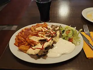 Pasta with kebab at Kebab House restaurant in Jyvaskyla, Finland