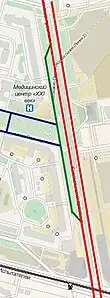 Adjacent roads (blue lines) connect only to a side road (Russian: карман, green line, tagged as side_road=rotary). There is no direct connection to the main carriageways (red lines).