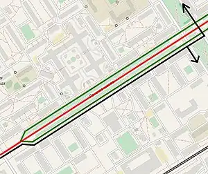 It is possible to make turns (black lines) only from the side roads (Russian: карманы, green lines, mapped as side_road=rotary). Turns from main carriageway (red line) are prohibited.