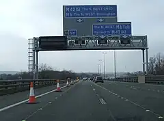 A toll gantry on M6 in the UK.