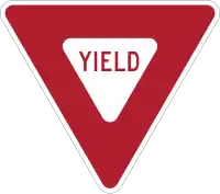 Standard Yield traffic sign from United States (MUTCD R1-2 yield sign, Page 5B-2, Manual on Uniform Traffic Control Devices for Streets and Highways - 2003 Edition)