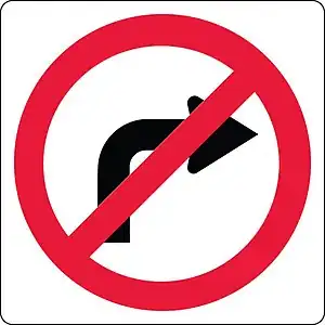 No_right_turn_with_backing_board_(New_Zealand_road_sign)