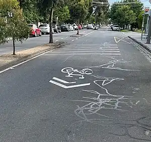 Sharrows markings on road surface in Melbourne