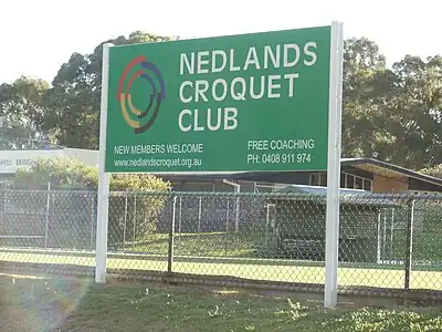 Sign of the Nedlands Croquet Club on Bruce Street in Nedlands, Western Australia.