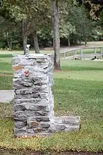 Beispiel eines öffentlichen Trinkbrunnens aus Stein.