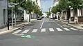 Vichy: on the right a softly segregating lane, opposite direction as shared lane