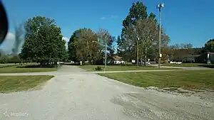 Pole-mounted tornado siren in the United States, identifiable by the unique horn shape: emergency=siren siren:purpose=tornado siren:type=electronic manufacturer=Whelen Engineering Company manufacturer:wikidata=Q7992391 siren:model=WPS-4000 [3] tower:type=siren support=pole