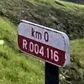 Belgium highway=milestone distance=0 ref=R4 carriageway_ref=116