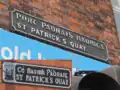 St. Patrick's Quay in Cork. Different spelling (of the irish name) on two edges of the same building.