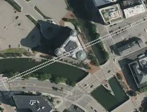 Here the path of a former railway goes across two rivers and through a building. There are no obvious remnants of a bridge.