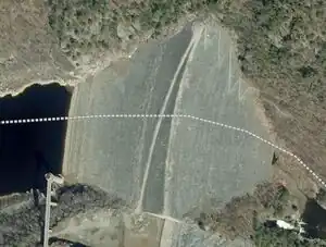 Here a dam and reservoir has been constructed on the path of a former railway.