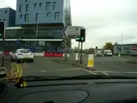 Traffic island at a Junction. Without tactile paving, but has a lowered kerb.