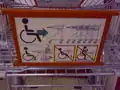 Sign on wheelchair trolley