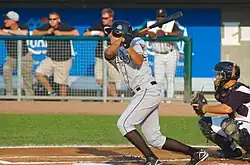 Alex Liddi following through on a swing
