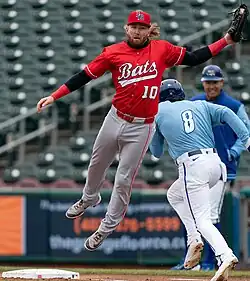 Wendzel jumping to catch a throw at first base for the Louisville Bats in 2025