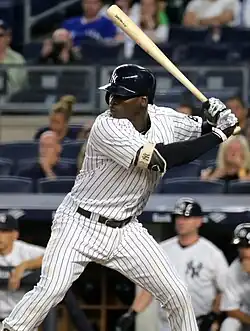 Didi Gregorius batting left handed in New York Yankees pinstripes in 2016