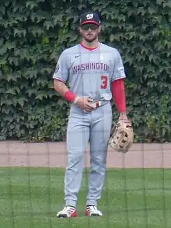 Crews standing in the outfield at Wrigley Field in 2025