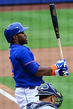 Eric Young Jr. batting right handed in a blue Mets uniform