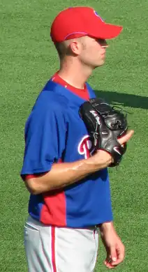 J. A. Happ in a blue Philadelphia Phillies jersey, looking to the right