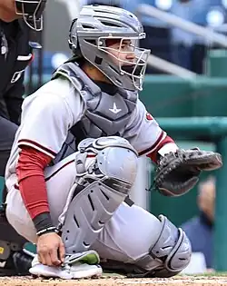 José Herrera crouched in full catchers gear with the Arizona Diamondbacks in 2022