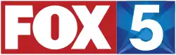 A wide rectangular logo. The left side is red and has the Fox network logo in white. The right side is blue with light blue searchlights in the background and a large white 5 in the middle.
