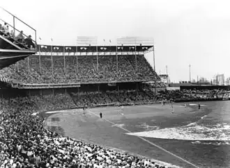 Kansas City Municipal Stadium, black and white, with a full crowd in the stands.