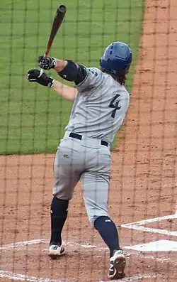 Ryan Vilade following through with a swing with the Asheville Tourists in 2018