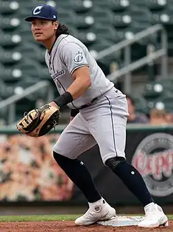 Yu Chang playing first base for the Columbus Clippers, standing near the base