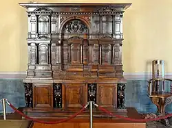 Wardrobe; c.1530; carved walnut; height: 230&nbsp;cm; Château d'Écouen[49]
