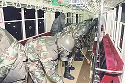 GSDF personnel decontaminating subway cars contaminated with sarin.