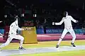 Russian Igor Turchin (left) and American Weston Kelsey (right) duel in second round of men's individual épée