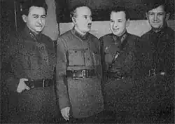 Four men in uniform