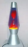 D. Lava lamp with interaction between dissimilar liquids: water and liquid wax