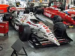 Newman/Haas IndyCar in black and white livery with red 5 number