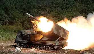 M270 MLRS launching a rocket