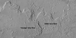 Lava flows on Olympus Mons with older and younger flows labeled, as viewed by HiRISE during the HiWish program
