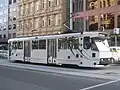 An A2-class tram on Flinders Street