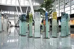 Contemporary free-standing Glasshenge series (2013/2014) by Tomasz Urbanowicz at Wrocław Airport, Poland