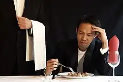 Eating with a fork at a restaurant