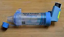 Photograph of an inhaler attached to a spacer