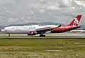 A7-AEG was the only Airbus A330-300 to spot the red colour scheme, although its livery design was similar to those with the yellow colour scheme.
