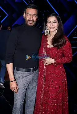 Photograph of Kajol and Ajay Devgn.