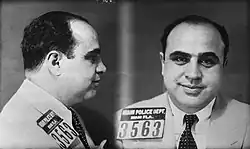 Two mugshots of Capone: one from the side, one face on