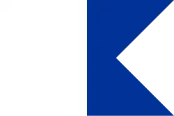 A flag, hoist half white, fly half blue, the fly edge has a triangular swallowtail cut-out along its full length