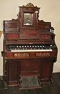 Parlor organ:[45][46][47] melodeon or American reed organ by American Reed Organ Co., Rotterdam[47]